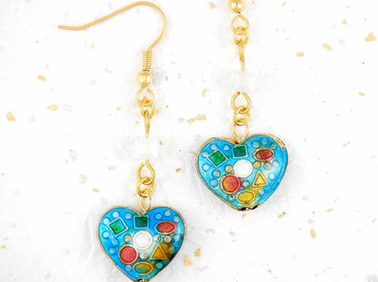 Long earrings with enamelled hearts in 3 colours (red, turquoise, black), geometric patterns, assorted Swarovski crystal cubes, gold-toned stainless steel hooks