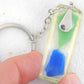 Keychain with handmade resin long rectangle, royal blue and mint green glass inclusions, stainless steel chain