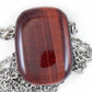 26-inch necklace with rectangular red tiger eye stone pendant, stainless steel chain