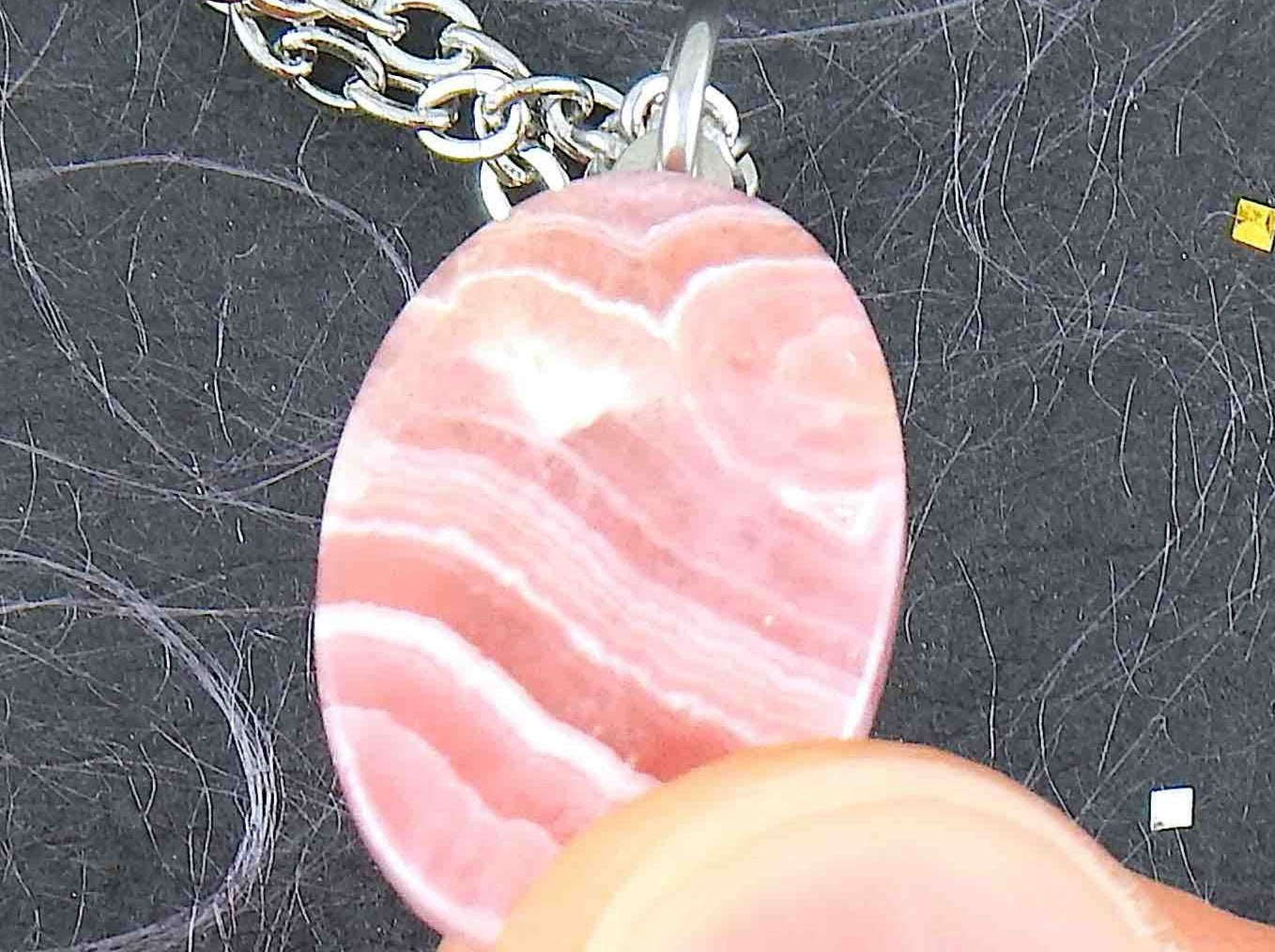 16-inch necklace with oval marbled pink-white rhodocrosite stone pendant, stainless steel chain