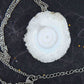 16-inch necklace with large solar quartz stone circular pendant, white with a hint of blue, stainless steel chain