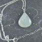 16-inch necklace with blue-green labradorite stone drop pendant, delicately veined, stainless steel chain