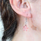 Short earrings with small translucent cherry quartz stone stars, stainless steel hooks