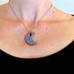 16-inch necklace with smooth jean blue half-moon ceramic pendant handmade in Montreal, stainless steel chain
