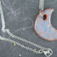 16-inch necklace with smooth jean blue half-moon ceramic pendant handmade in Montreal, stainless steel chain