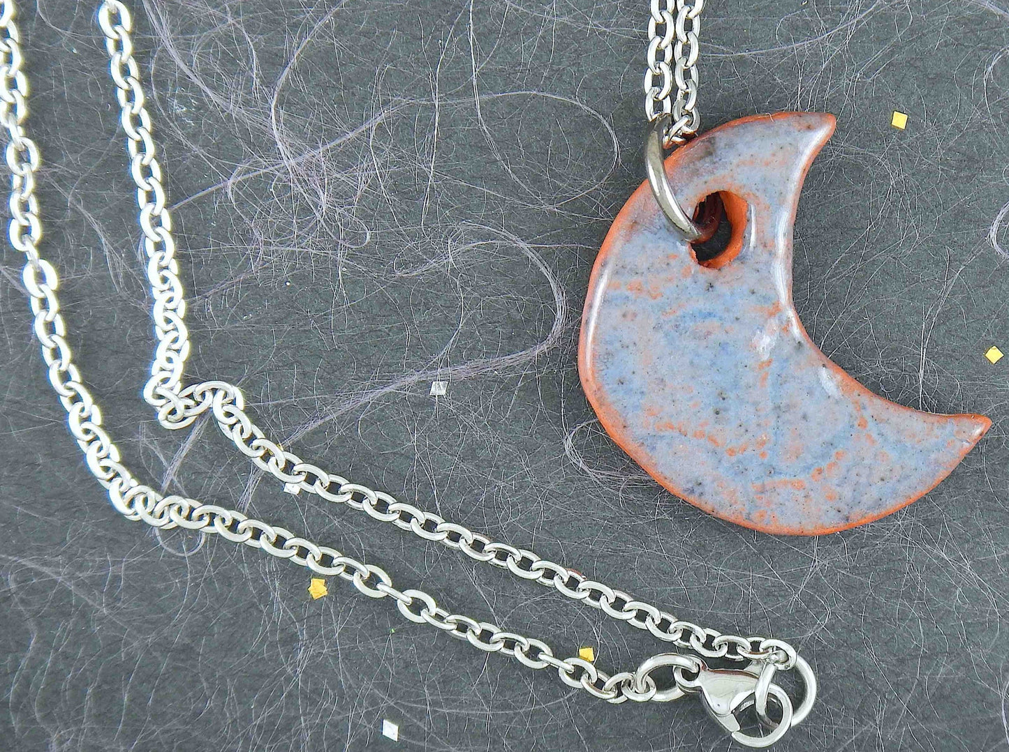 16-inch necklace with smooth jean blue half-moon ceramic pendant handmade in Montreal, stainless steel chain