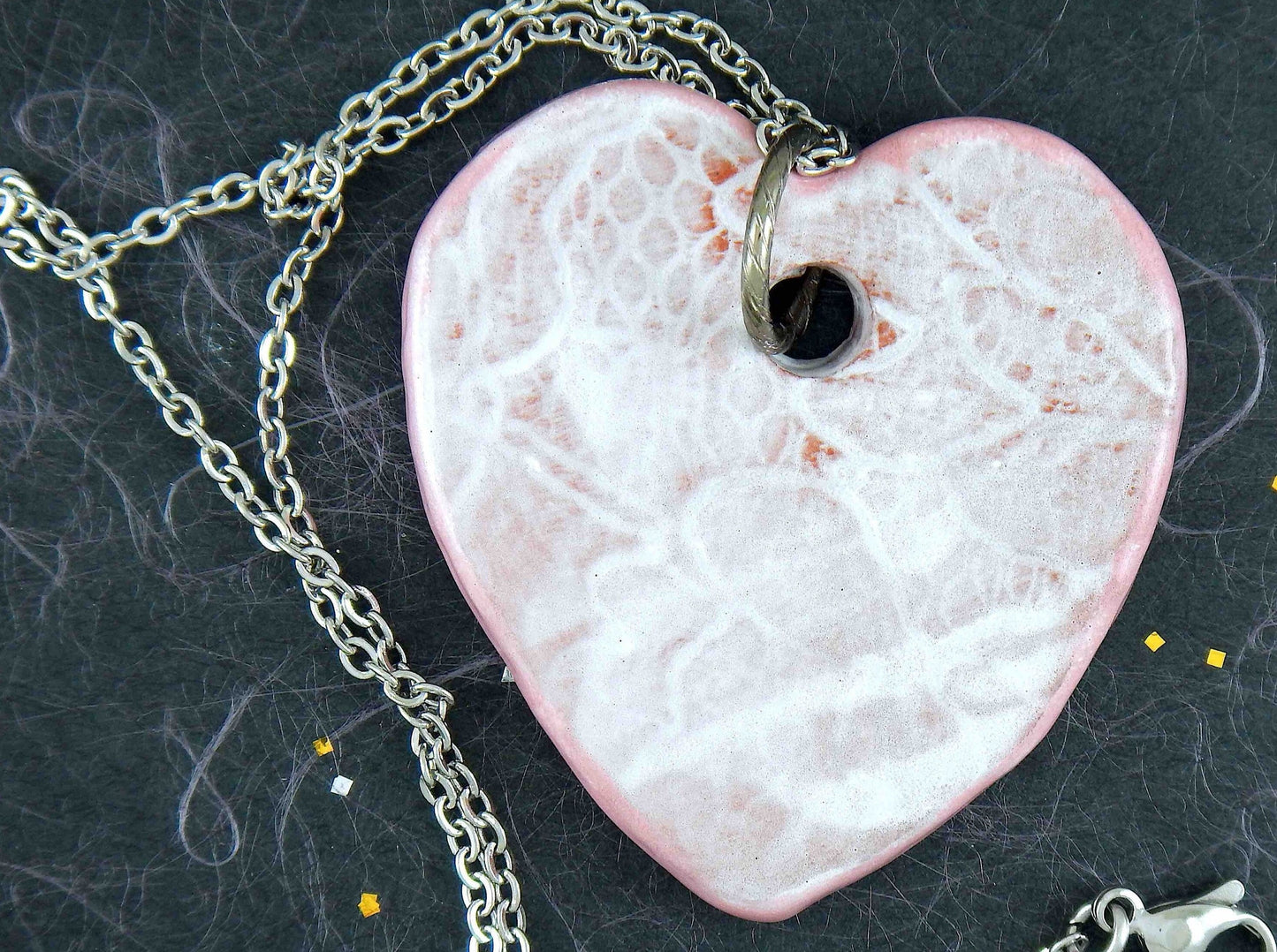 16-inch necklace with off-white ceramic heart pendant handmade in Montreal, lace pattern, stainless steel chain
