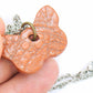 16-inch necklace with terra cotta butterfly ceramic pendant handmade in Montreal, lace pattern, stainless steel chain