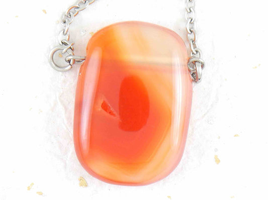 26-inch necklace with rectangular orange and clear carnelian stone pendant, stainless steel chain