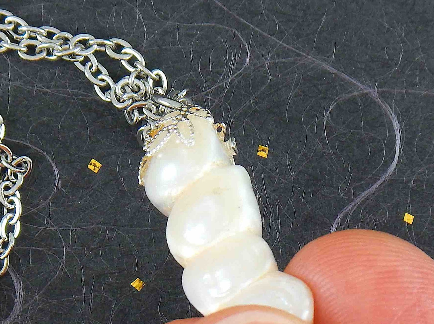 16-inch necklace with column pendant made of 4 fused natural white freshwater pearls, stainless steel chain