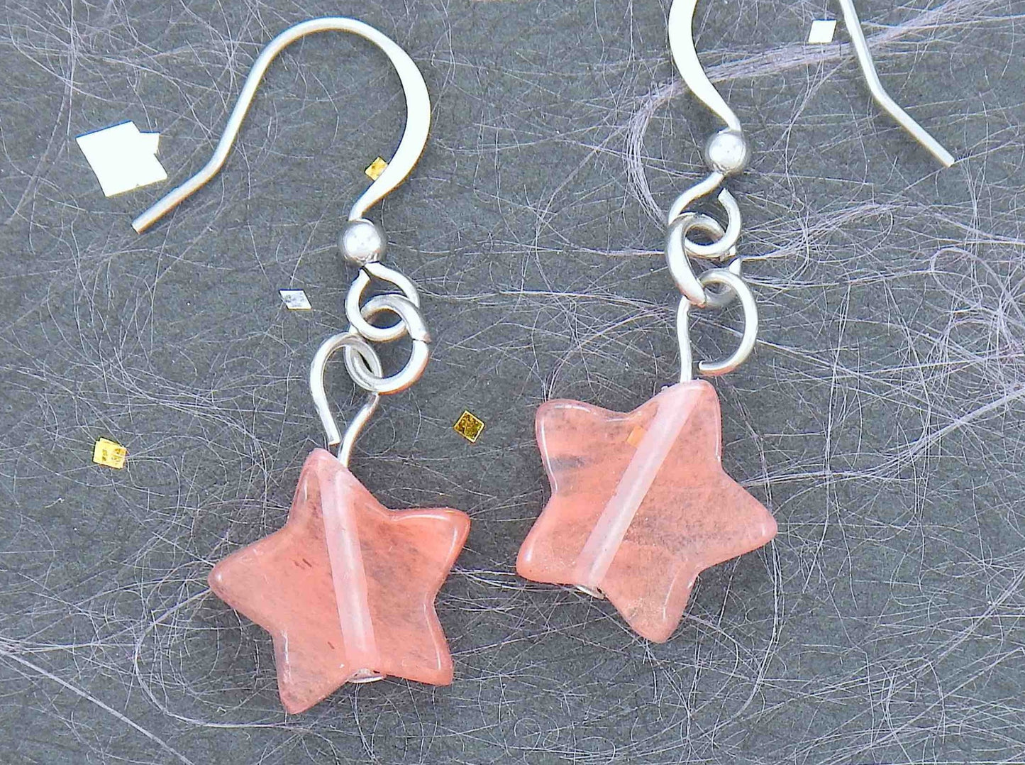 Short earrings with small translucent cherry quartz stone stars, stainless steel hooks