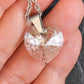 16-inch necklace with 15mm silver patina faceted Swarovski crystal heart pendant, stainless steel chain