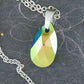 15-inch necklace with 20mm Swarovski crystal drop pendant, 1 side Scarabeus Green, 1 side Silver Gray, stainless steel chain