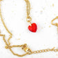 15-inch necklace with 10mm deep red faceted crystal heart pendant, gold-toned stainless steel chain
