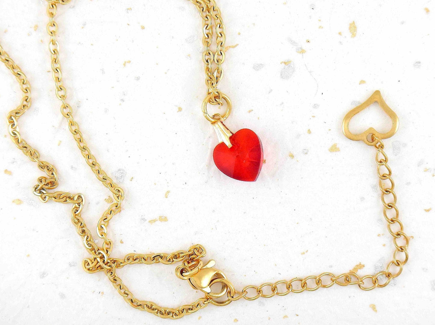 15-inch necklace with 10mm deep red faceted crystal heart pendant, gold-toned stainless steel chain