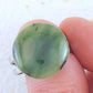 Finger ring with round dark green nephrite jade stone cabochon, stainless steel adjustable base