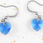 Short earrings with 10mm faceted blue Swarovski crystal hearts, stainless steel hooks