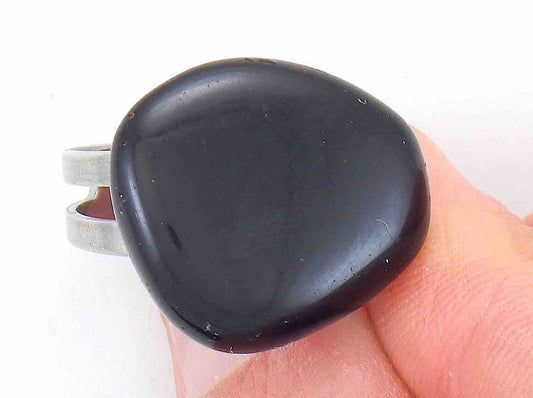 Finger ring with large smooth baroque black obsidian stone cabochon, stainless steel adjustable base