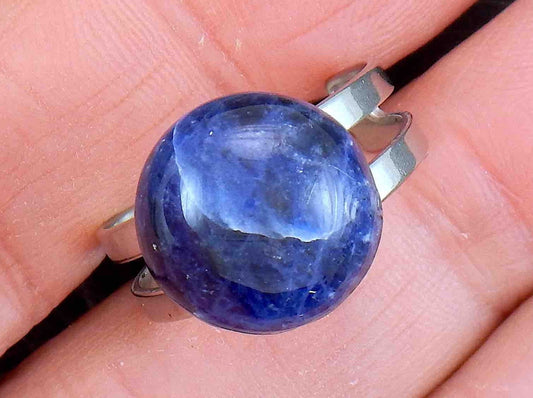 Finger ring with round sodalite cabochon 2 shades of blue, stainless steel adjustable base