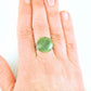 Finger ring with round dark green nephrite jade stone cabochon, stainless steel adjustable base