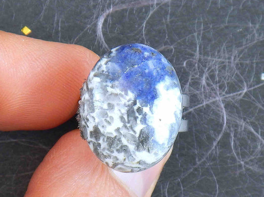 Finger ring with natural sodalite stone cabochon, large oval marbled in blue-grey-white, stainless steel adjustable base (US 5-6)