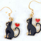 Short earrings "Cat Love" with enamelled black cats and red hearts, gold-toned stainless steel hooks