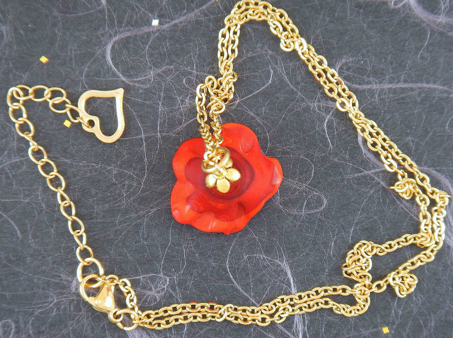 20-inch necklace with bright red Murano glass flower corolla, gold-toned stainless steel chain