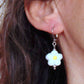 Short earrings with opaque Murano glass daisies in 3 colours (white/yellow, white/black, black/white), stainless steel lever back hooks
