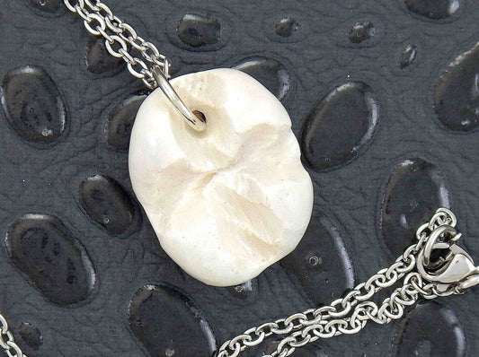 16-inch necklace with white ceramic knot pendant handmade in Montreal, stainless steel chain