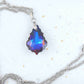 16-inch necklace with 22mm Volcano (blue, violet, red, orange) baroque Swarovski crystal pendant, stainless steel chain