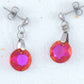 Boucles d'oreilles courtes cristaux Swarovski Classic Cut 10mm Astral Pink/Light Siam (rose/rouge), tiges acier inoxydable à boutons cristal