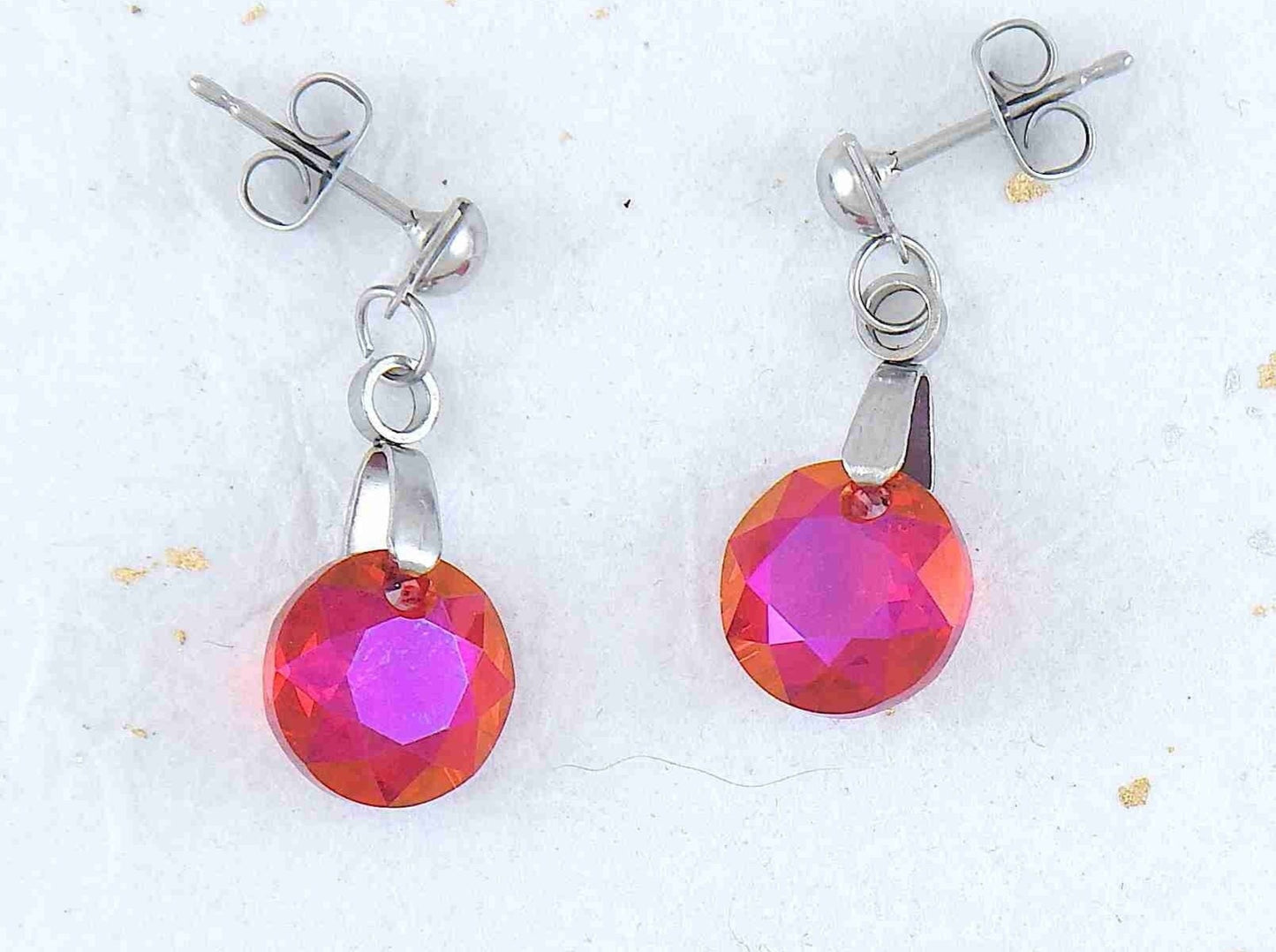 Short earrings with 10mm Astral Pink/Light Siam (red/pink) Classic Cut Swarovski crystals, stainless steel studs with tiny crystals