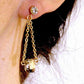 Long earrings with 10mm Gold Patina patterned Swarovski crystal pendulums, gold-toned stainless steel chain and crystal posts