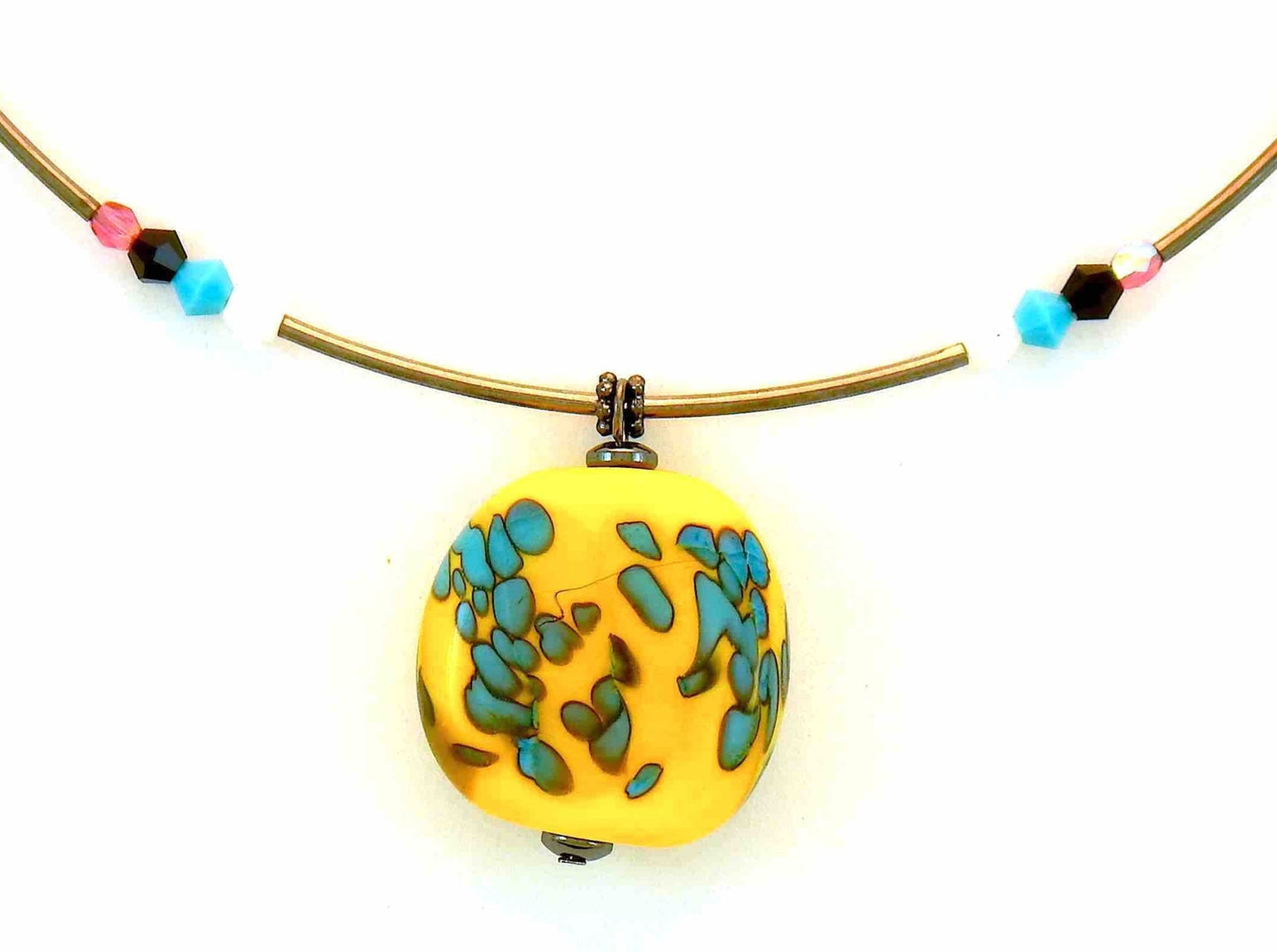 11-inch necklace with bright yellow-pink-blue-white modern art style pendant (Murano-style glass handmade in Montreal), matching Swarovski crystals, hoop design, pink aluminum chain