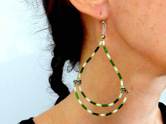Long statement earrings with original hoop design in white and green, metal hooks