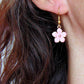 Short earrings with enamelled cherry blossoms (sakura) in 4 pastel colours (white, lilac, pink, blue), gold-toned stainless steel hooks