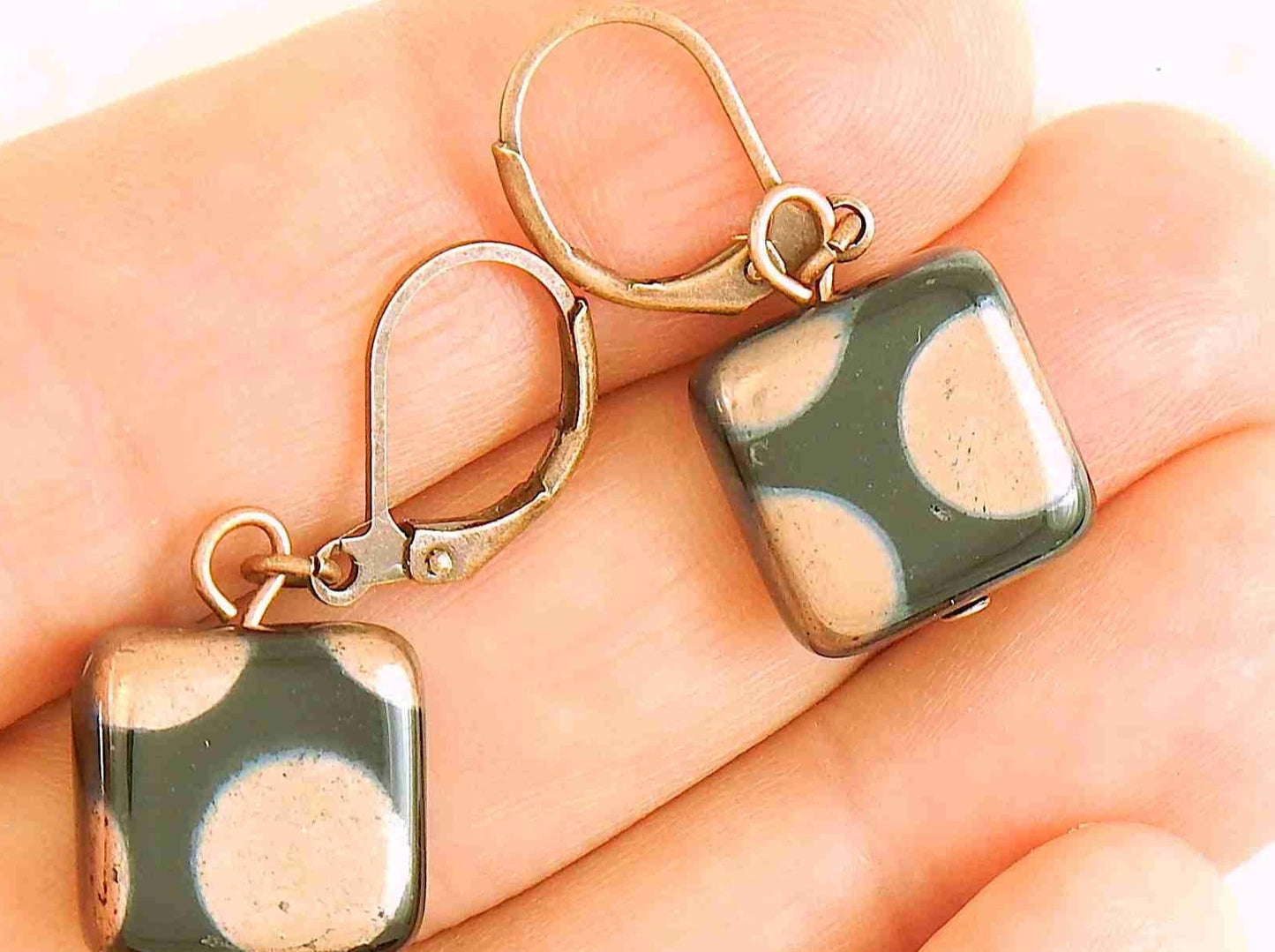 Short earrings with small shiny black Czech glass squares, large silver/copper/multicoloured dots, stainless steel lever back hooks