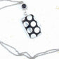 Collier 25 po avec bille rectangulaire de verre tchèque noir à pois argentés ou cuivrés, chaîne acier inoxydable assortie