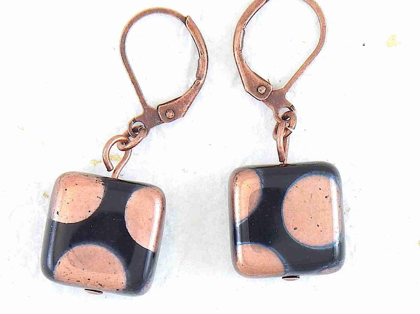 Short earrings with small shiny black Czech glass squares, large silver/copper/multicoloured dots, stainless steel lever back hooks