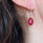 Short earrings with iridescent deep burgundy red vintage glass raspberry beads, rose gold-toned stainless steel hooks