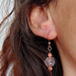 Short earrings with iridescent light peach vintage glass raspberry beads, rose gold-toned stainless steel hooks
