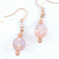 Short earrings with iridescent light peach vintage glass raspberry beads, rose gold-toned stainless steel hooks